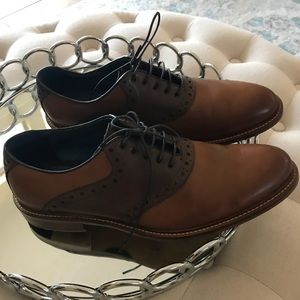 Men’s saddle brown dress shoes.